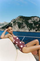 Monopoli - One-Piece in Plum / Pink Polka Dot — reclining side view