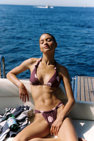 Tiramisu - Bikini in Plum and pink polka dot — front view by the sea
