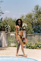 Tiramisu - Bikini in Black / White Polka Dot — full poolside view
