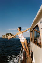 Bella - One-Piece in White Cherry — full boat view