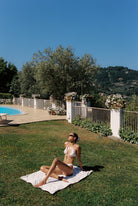 Vita - Bikini in White Cherry — wide poolside garden view