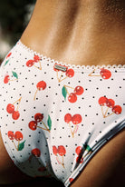 Vita - Bikini in White Cherry — cherry print and lace trim close-up